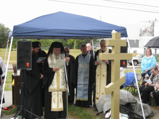 Bp. Basil blesses site.